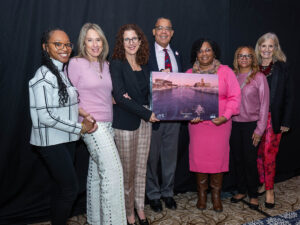 GLFHC President & CEO Guy L. Fish, MD, MBA (center) presents members of The Ellie Fund with the Rosalyn Kempton Wood Award for Inspirational Leadership. The members are, from left, Camille Bryant, Cheryl Whetstone, Meredith Mendelson, Dr. Fish, Nekia Clark, Denise Hayes, and Susan Gilmore.
